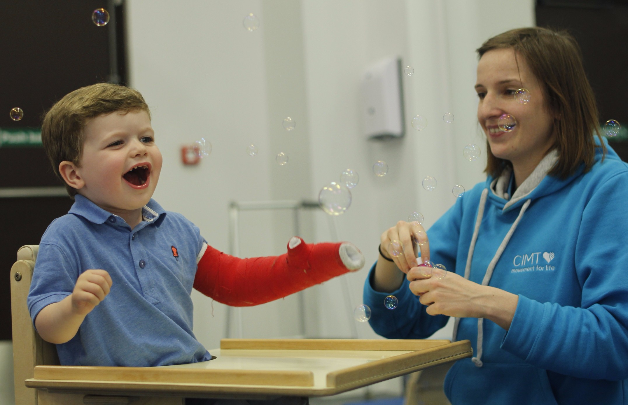 Child playing with bubbles