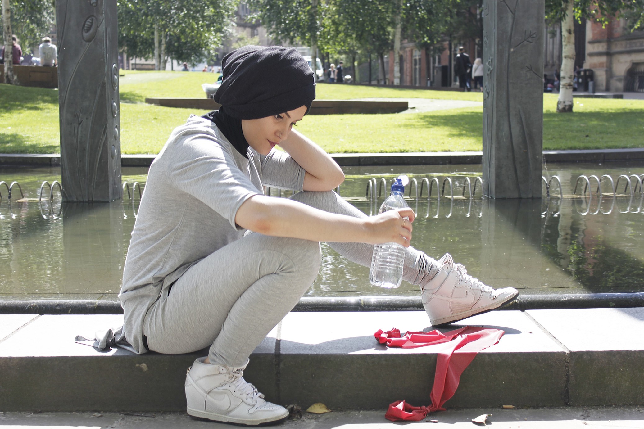 By the water feature.