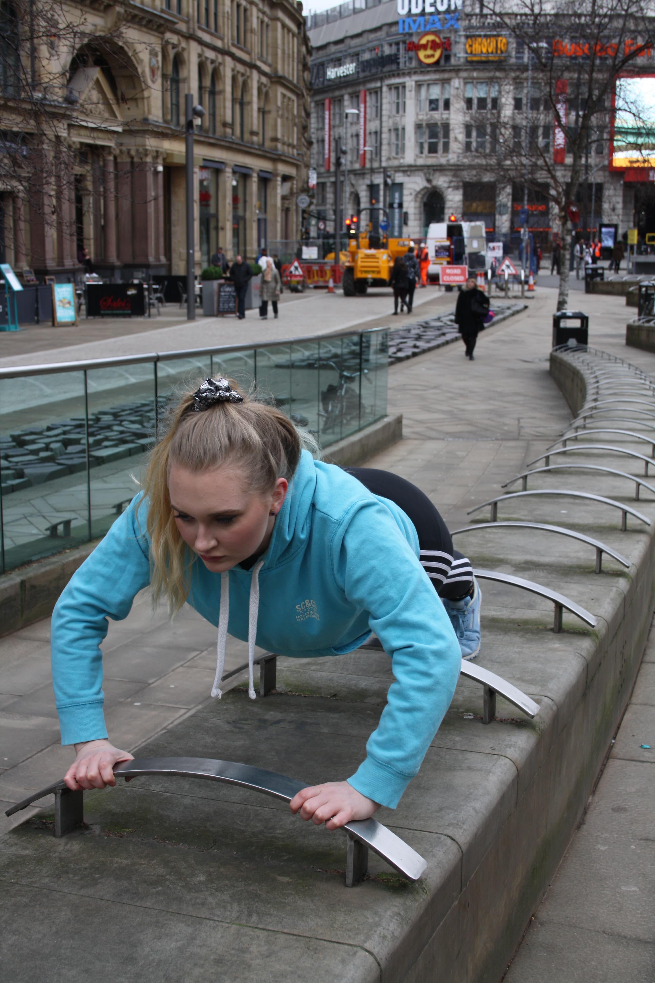 Girl doing pressups.