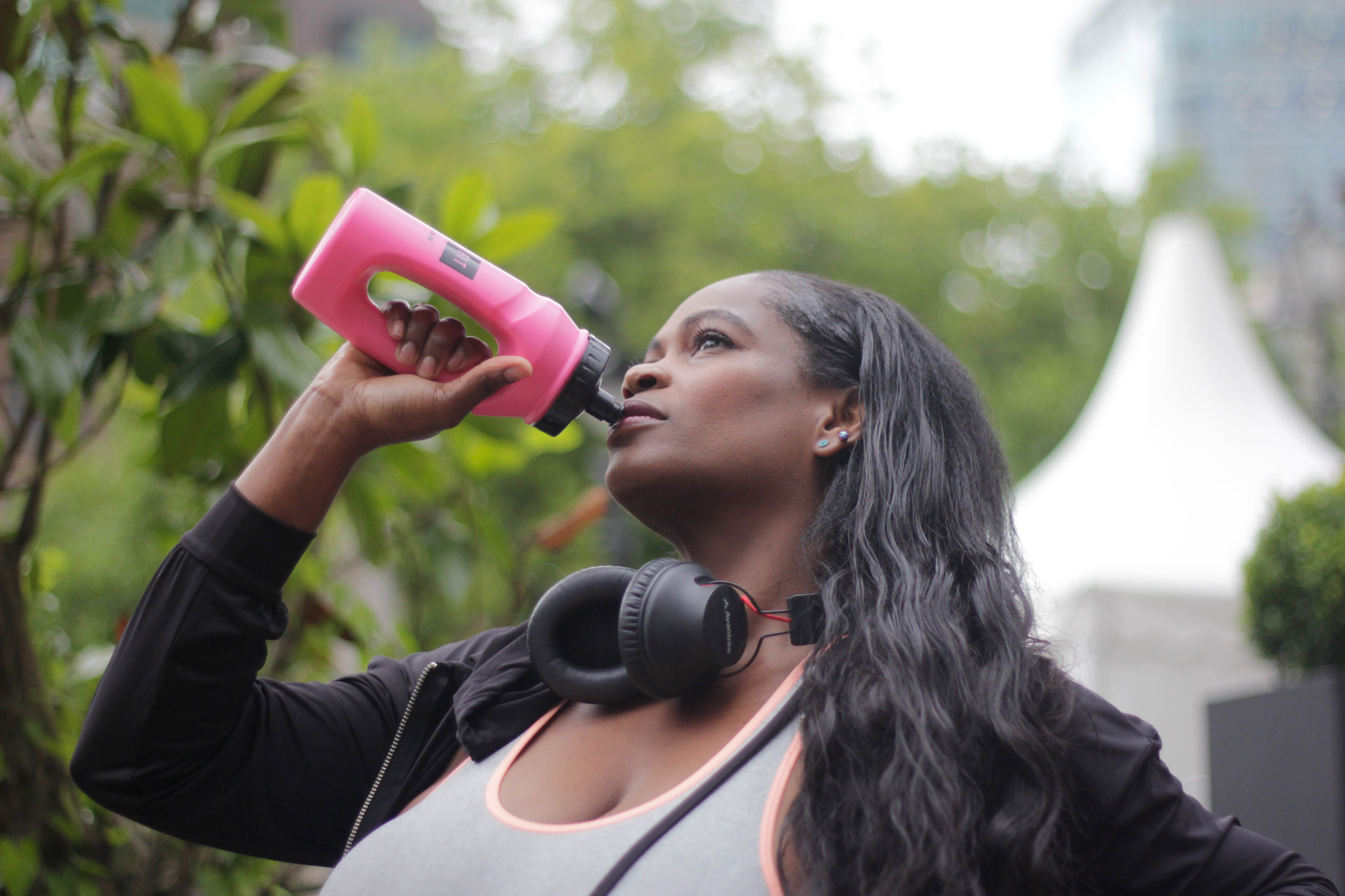 Woman drinking.