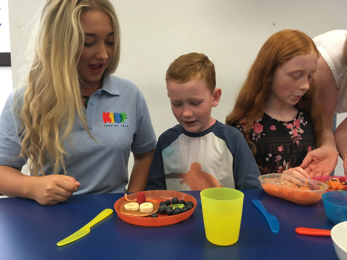 Kids Feeding Team specialist working with patient.