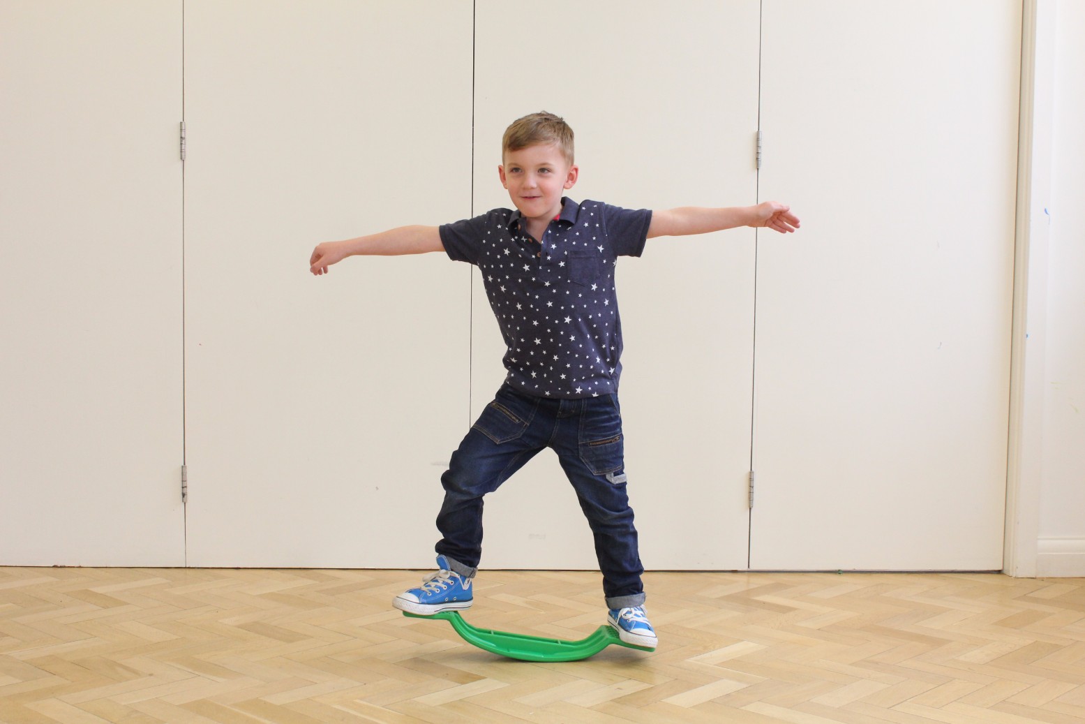 Child on a balance board.