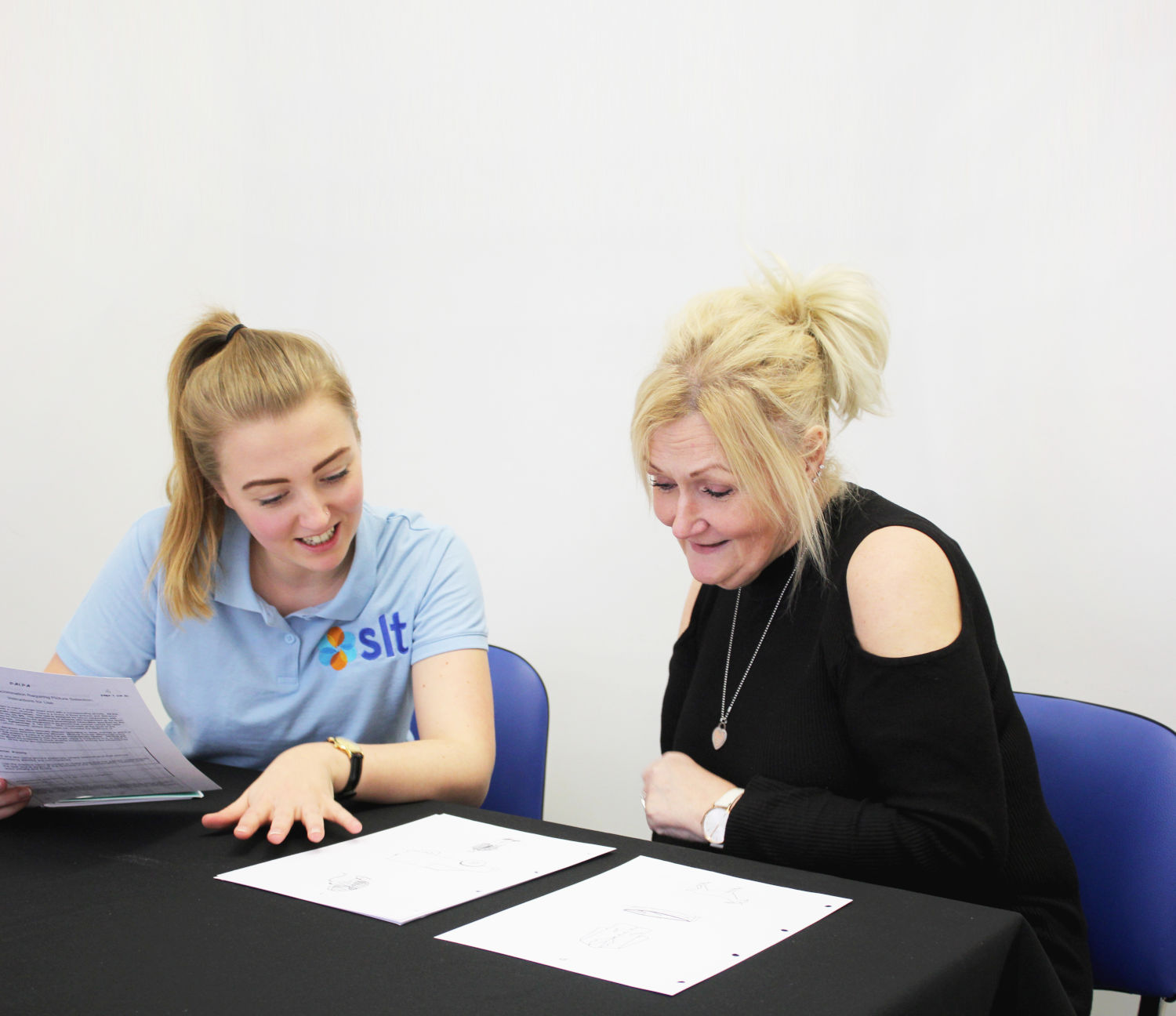 SLT's Chloe working with a patient.