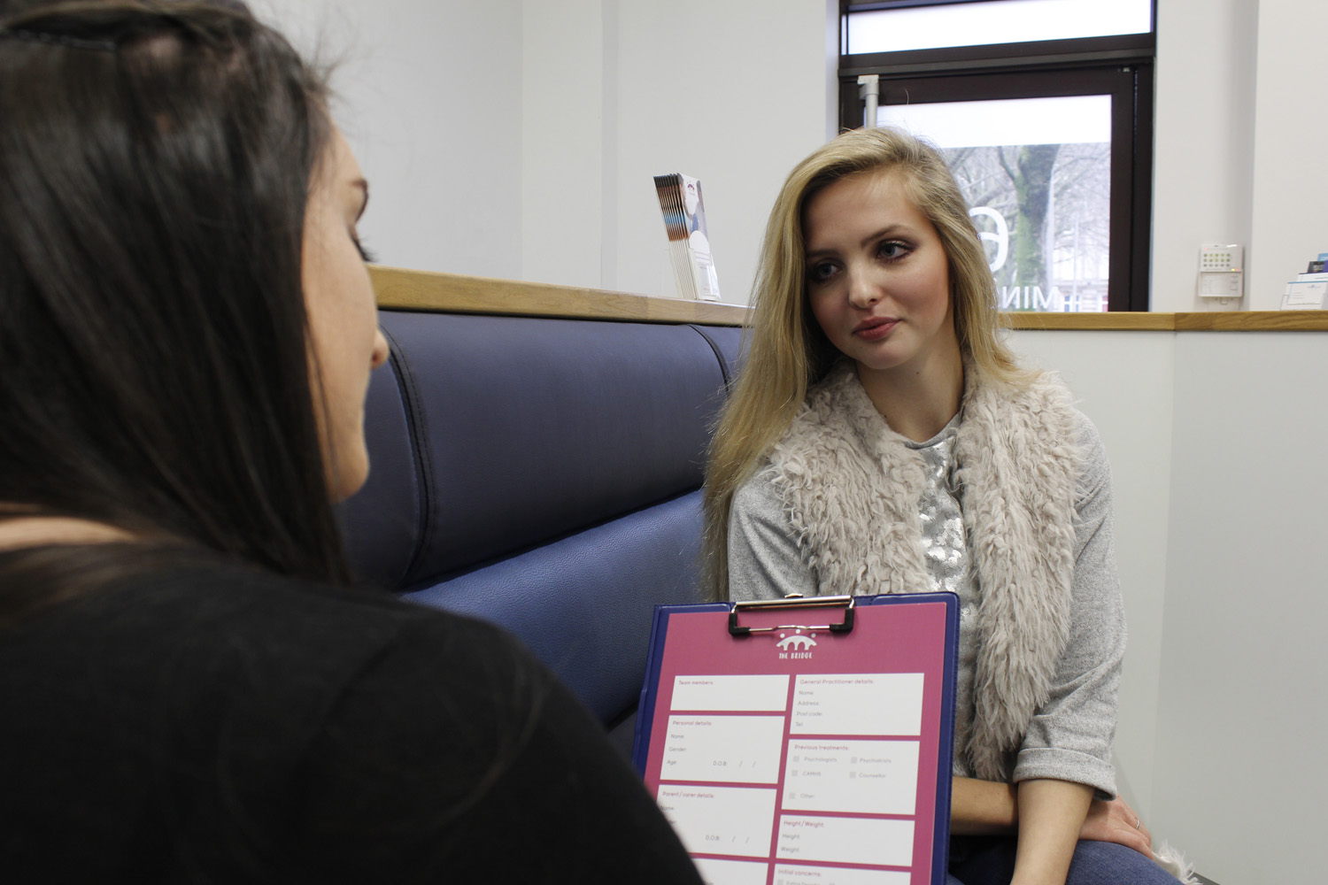 Patient looking at her therapist.