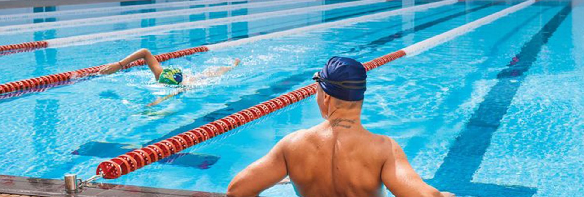 Man watching another swimmer.